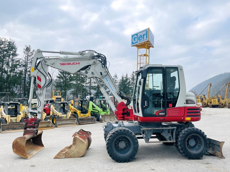Takeuchi TB295W (3750) - Колёсный экскаватор: фото 1 Takeuchi TB295W (3750) - Колёсный экскаватор: фото 1
