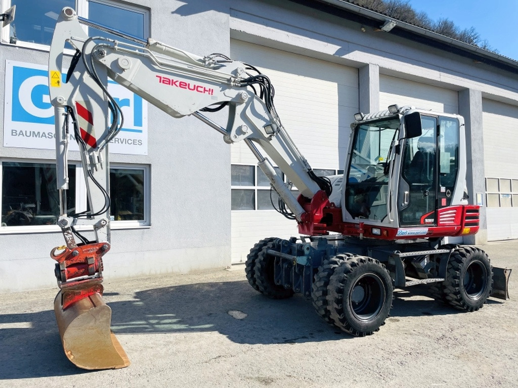 Takeuchi TB295W (3964) - Колёсный экскаватор: фото 5 Takeuchi TB295W (3964) - Колёсный экскаватор: фото 5