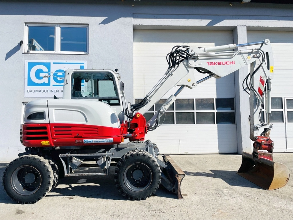 Takeuchi TB295W (3964) - Колёсный экскаватор: фото 2 Takeuchi TB295W (3964) - Колёсный экскаватор: фото 2