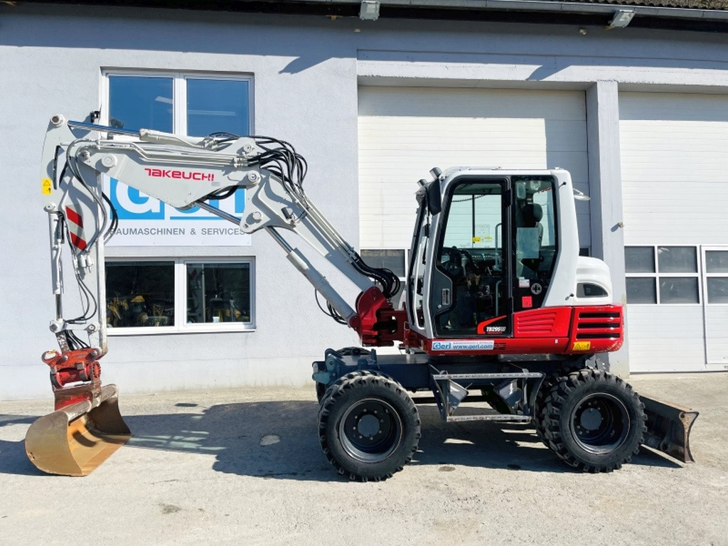Takeuchi TB295W (3964) - Колёсный экскаватор: фото 3 Takeuchi TB295W (3964) - Колёсный экскаватор: фото 3
