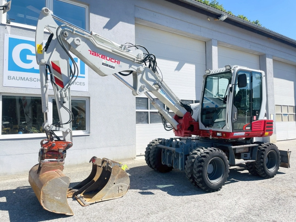 Takeuchi TB295W (4045) - Колёсный экскаватор: фото 3 Takeuchi TB295W (4045) - Колёсный экскаватор: фото 3