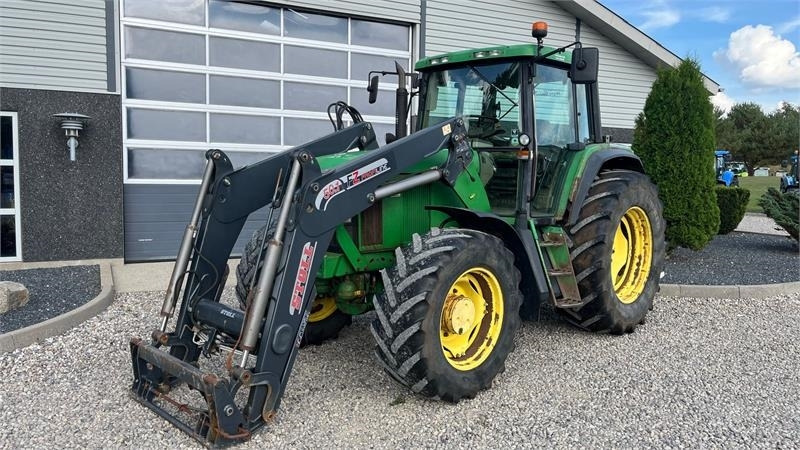 John Deere 6910 Auto Quad II-TLS Med frontlæsser - Трактор: фото 2 John Deere 6910 Auto Quad II-TLS Med frontlæsser - Трактор: фото 2