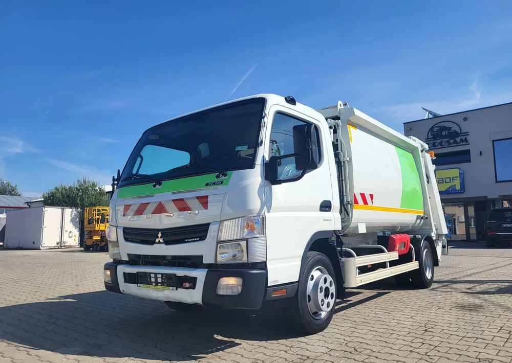 Mitsubishi Fuso Canter - Мусоровоз: фото 1 Mitsubishi Fuso Canter - Мусоровоз: фото 1