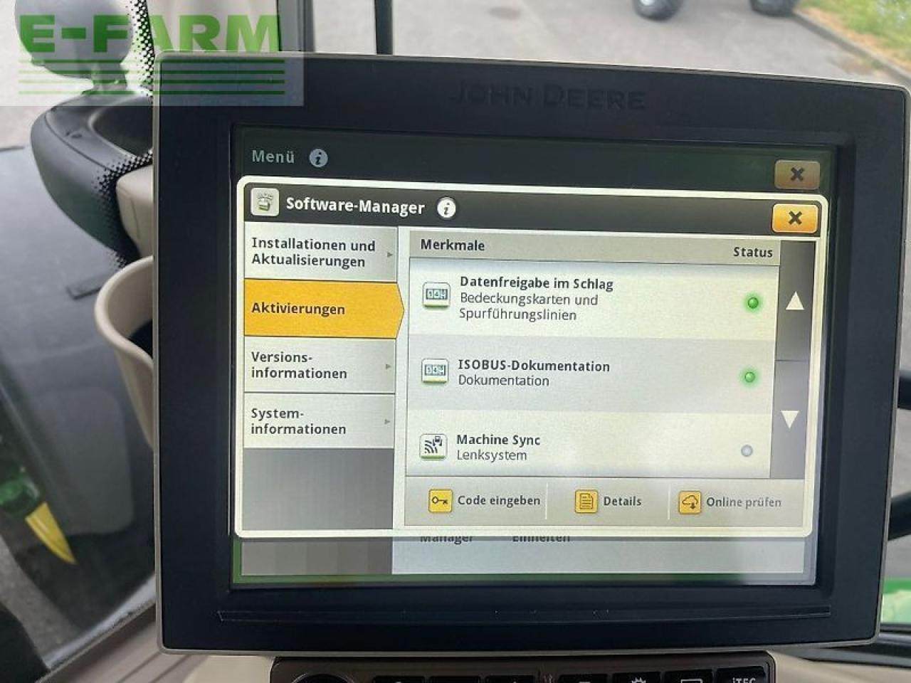 Трактор John Deere 6215r: фото 13