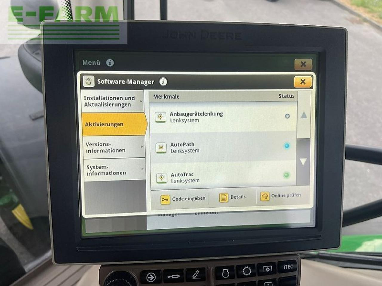 Трактор John Deere 6215r: фото 15