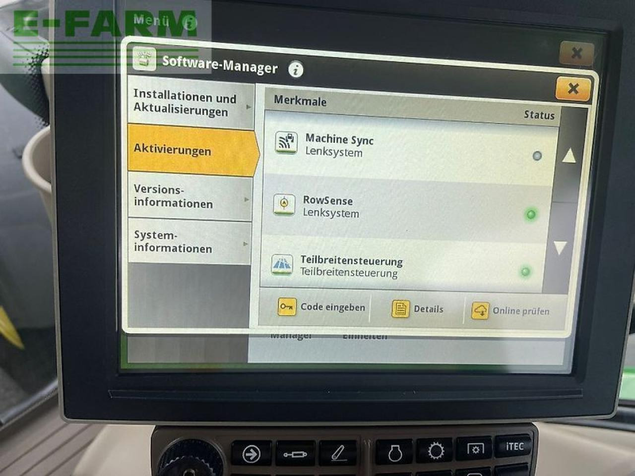 Трактор John Deere 6215r: фото 16