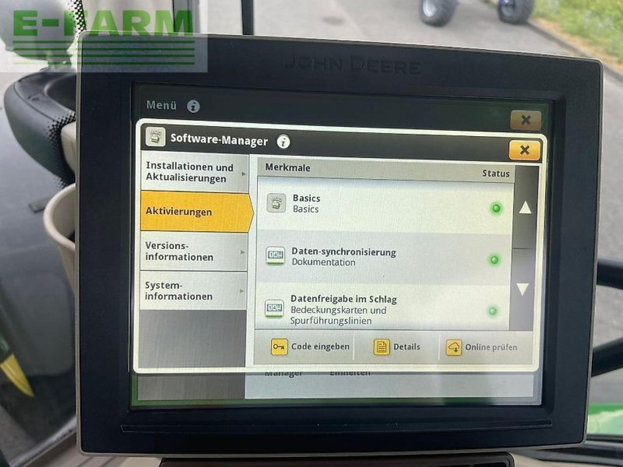 Трактор John Deere 6215r: фото 14