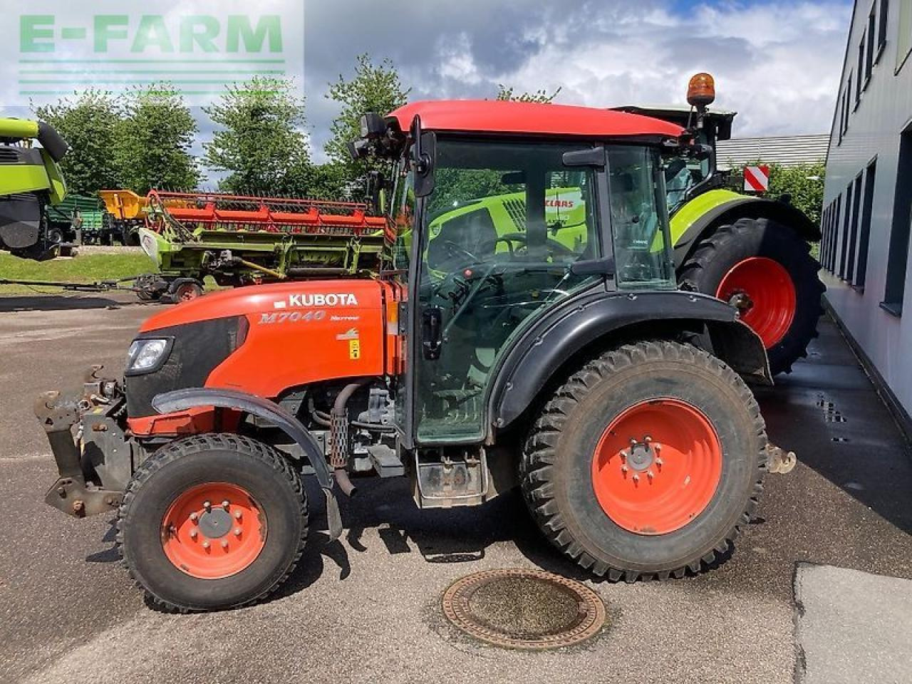 Kubota m7040 - Трактор: фото 1 Kubota m7040 - Трактор: фото 1