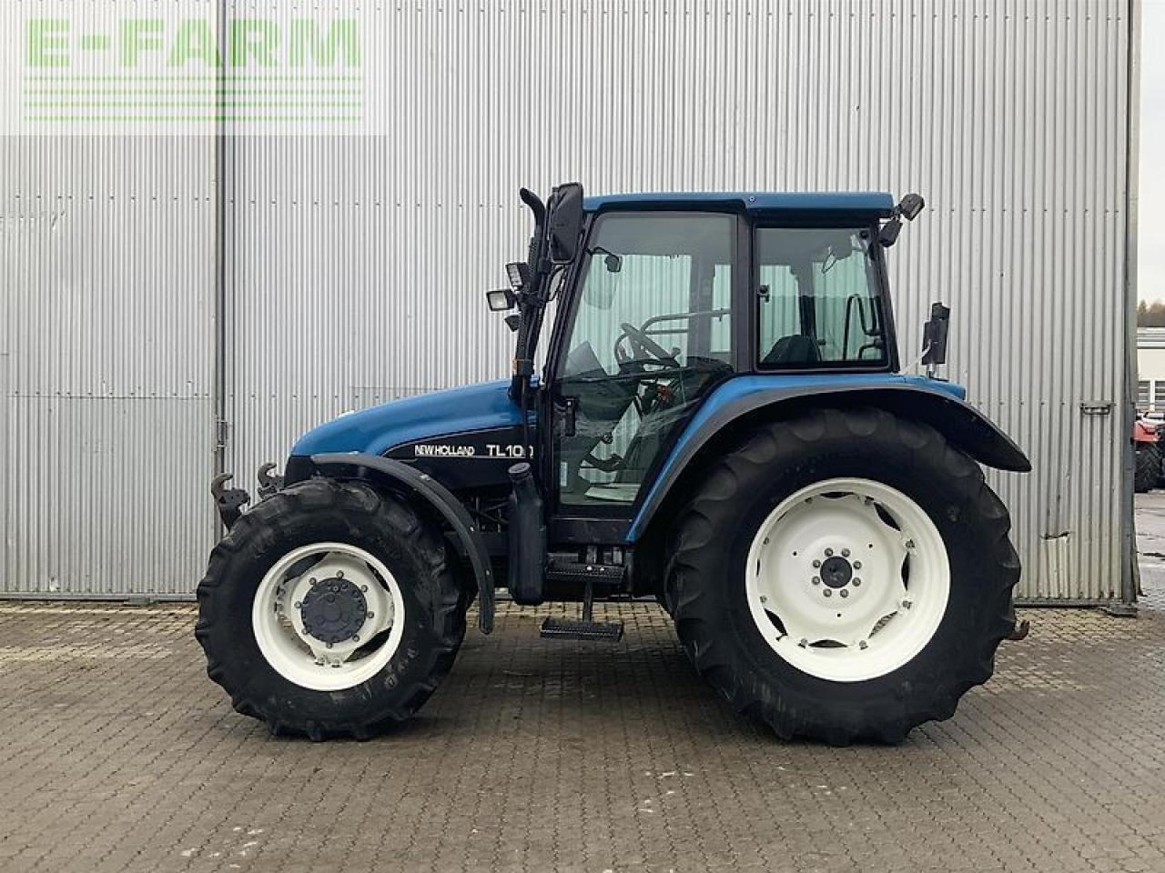 New Holland tl 100 - Трактор: фото 1 New Holland tl 100 - Трактор: фото 1