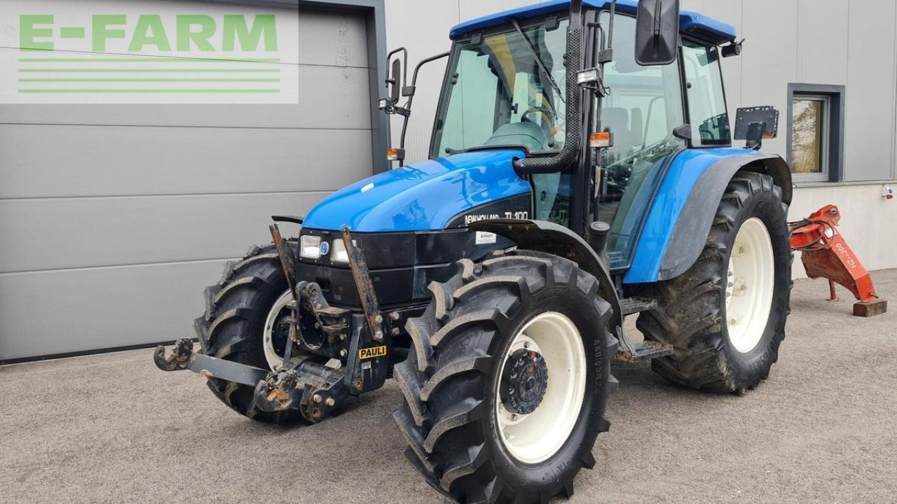 New Holland tl100 (4wd) - Трактор: фото 1 New Holland tl100 (4wd) - Трактор: фото 1