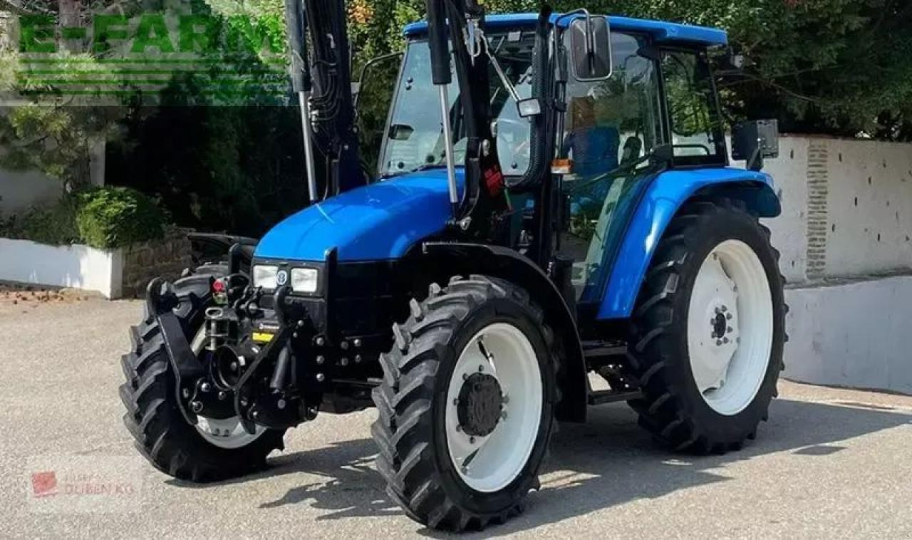 New Holland tl100 (4wd) - Трактор: фото 1 New Holland tl100 (4wd) - Трактор: фото 1