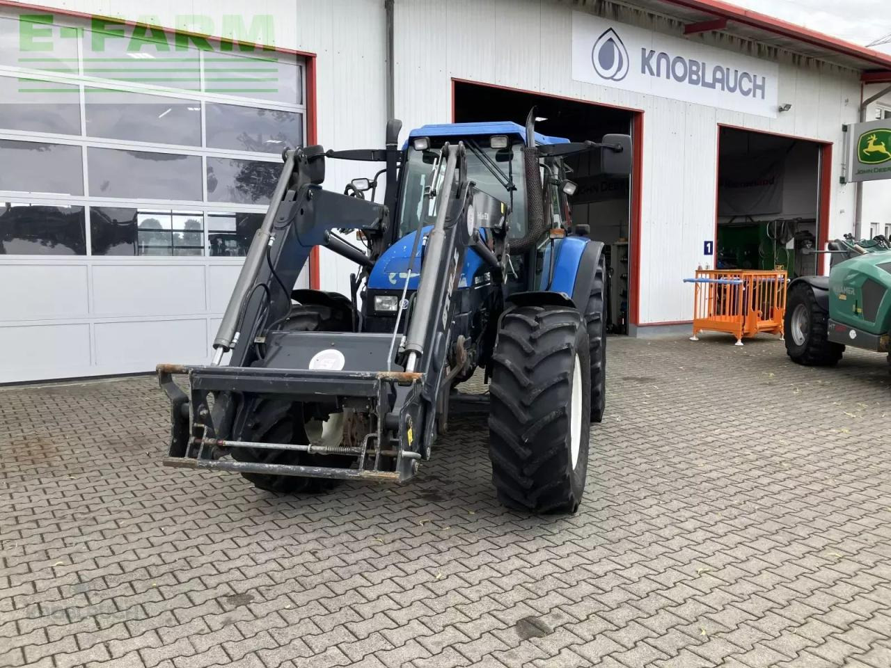 New Holland ts 115 - Трактор: фото 2 New Holland ts 115 - Трактор: фото 2