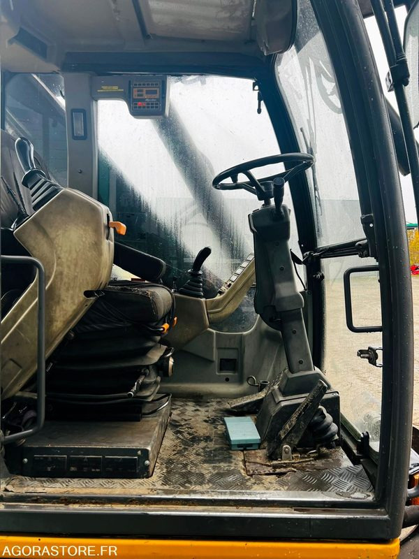 Экскаватор Pelle Mecalac 14 MBX - 2003 / 9940 HEURES: фото 9 Экскаватор Pelle Mecalac 14 MBX - 2003 / 9940 HEURES: фото 9