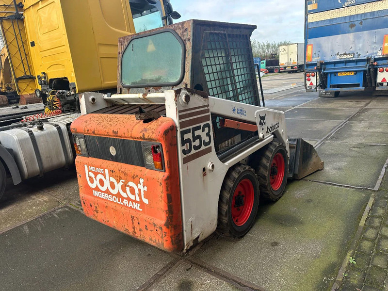 Bobcat 553 - Мини-погрузчик с бортовым поворотом: фото 4 Bobcat 553 - Мини-погрузчик с бортовым поворотом: фото 4