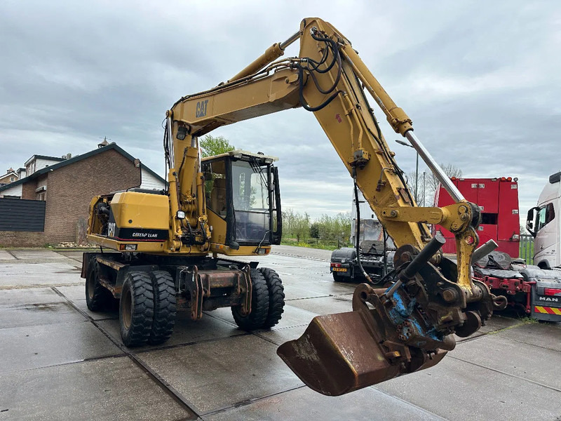 Caterpillar M315 +ROTO CE - Колёсный экскаватор: фото 3 Caterpillar M315 +ROTO CE - Колёсный экскаватор: фото 3