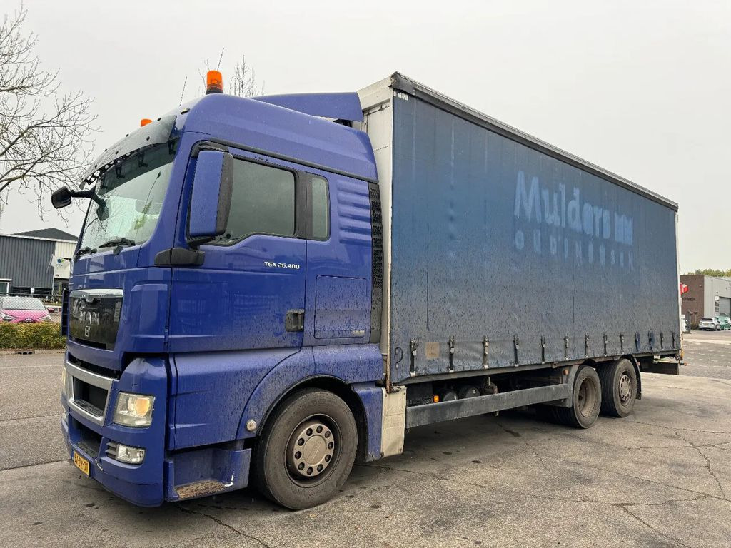 MAN TGX 26.400 6X2 - EURO 4 + LIFT + STEERING AXLE + - Тентованный грузовик: фото 1 MAN TGX 26.400 6X2 - EURO 4 + LIFT + STEERING AXLE + - Тентованный грузовик: фото 1