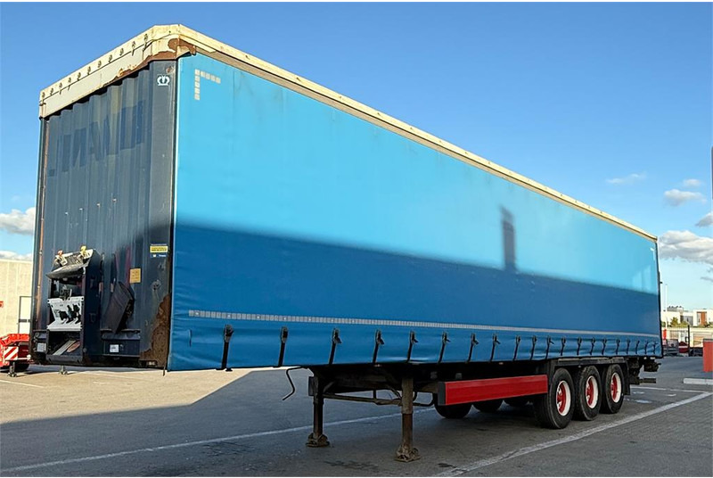 Krone 34 pl. - Тентованный полуприцеп: фото 1 Krone 34 pl. - Тентованный полуприцеп: фото 1