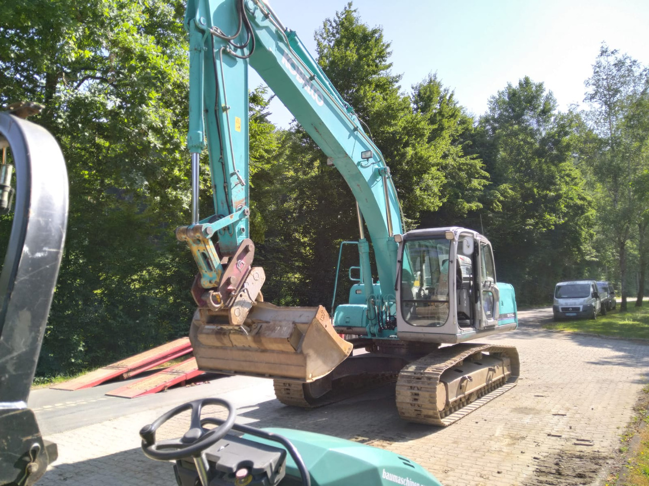 KOBELCO SK 210 NLC-6E - Гусеничный экскаватор: фото 1 KOBELCO SK 210 NLC-6E - Гусеничный экскаватор: фото 1