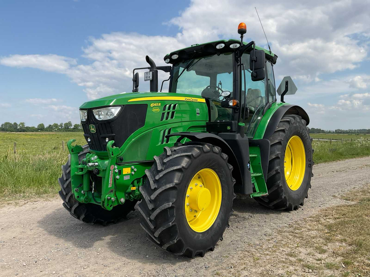 John Deere 6145R - Трактор: фото 1 John Deere 6145R - Трактор: фото 1