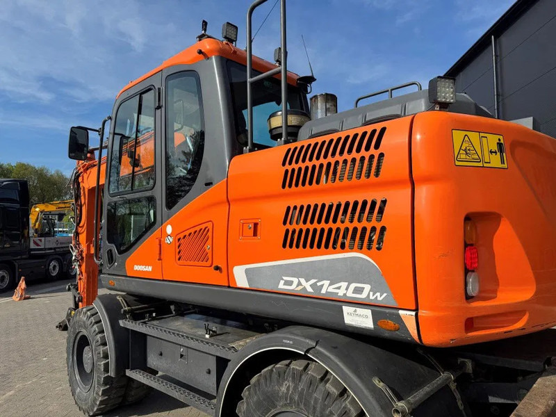 Doosan DX140-5 2018 - Колёсный экскаватор: фото 4 Doosan DX140-5 2018 - Колёсный экскаватор: фото 4