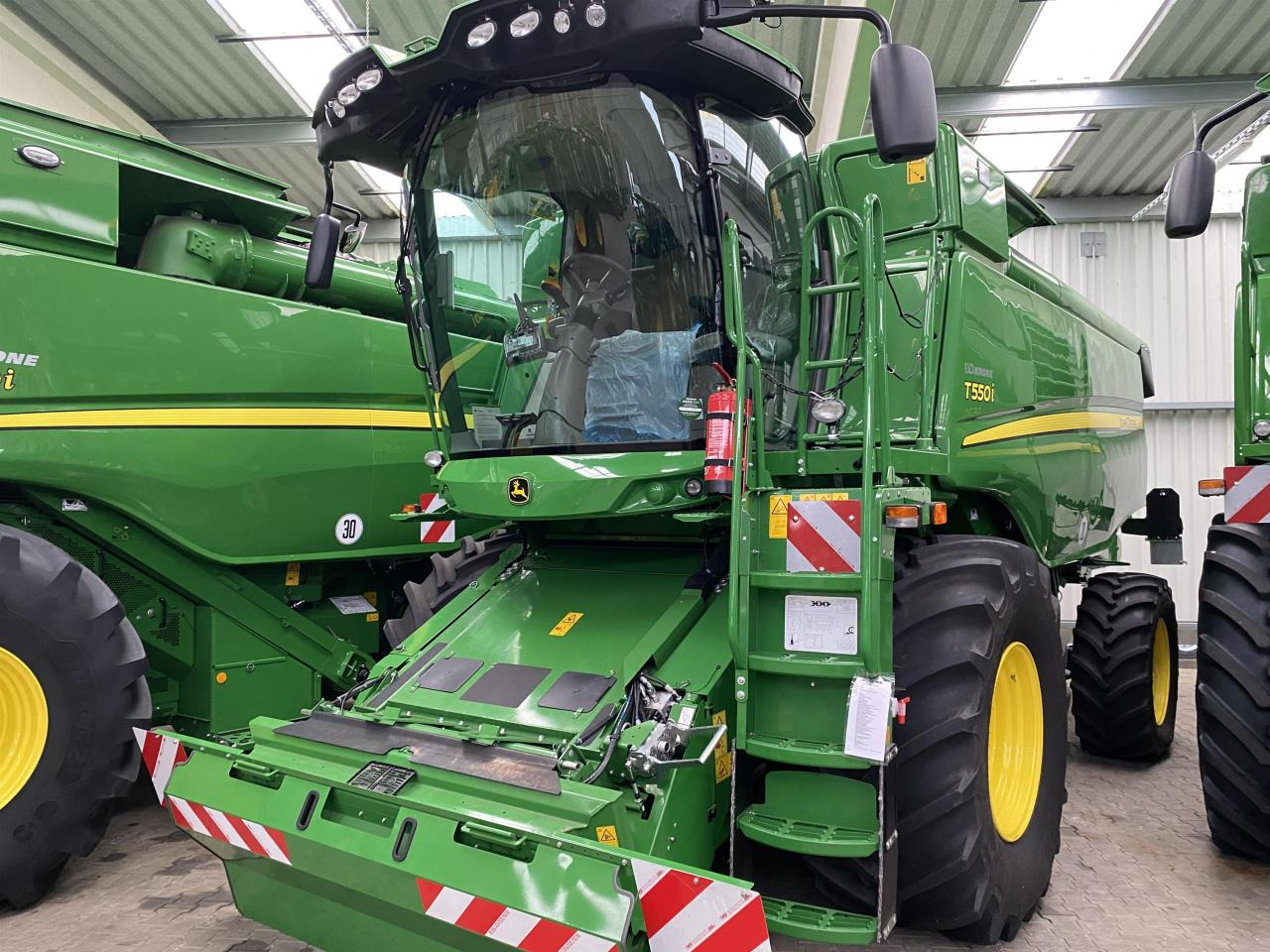 John Deere T550i - Зерноуборочный комбайн: фото 2 John Deere T550i - Зерноуборочный комбайн: фото 2