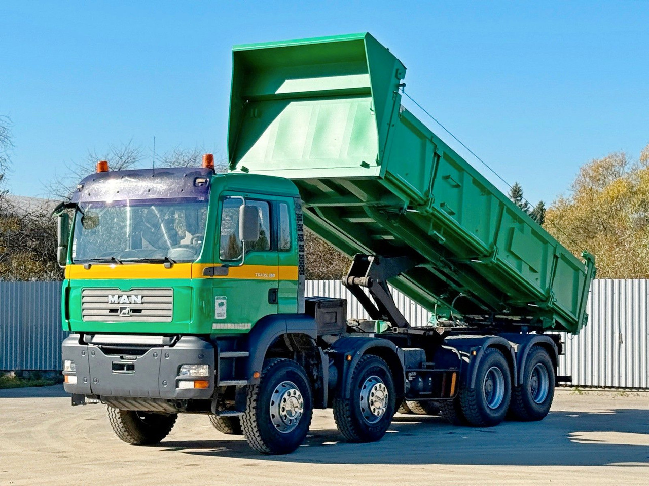 MAN TGA 35.360 * KIPPER 6,10 m + BORDMATIC / 8x4*TOP - Самосвал, Автоманипулятор: фото 1 MAN TGA 35.360 * KIPPER 6,10 m + BORDMATIC / 8x4*TOP - Самосвал, Автоманипулятор: фото 1