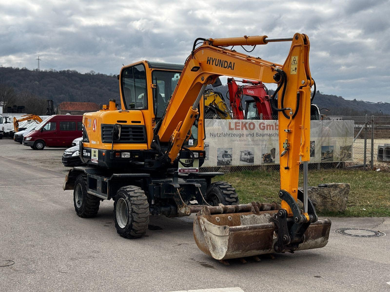 Hyundai Robex 55W-9A - Колёсный экскаватор: фото 1 Hyundai Robex 55W-9A - Колёсный экскаватор: фото 1