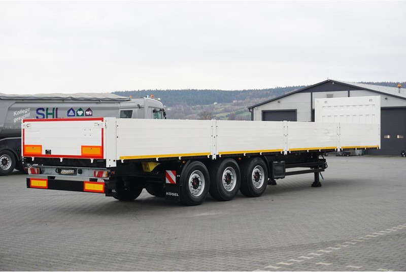 Kögel BURTOWA / BUDOWLANA / OŚ PODNOSZONA - Полуприцеп бортовой/ Платформа: фото 5 Kögel BURTOWA / BUDOWLANA / OŚ PODNOSZONA - Полуприцеп бортовой/ Платформа: фото 5