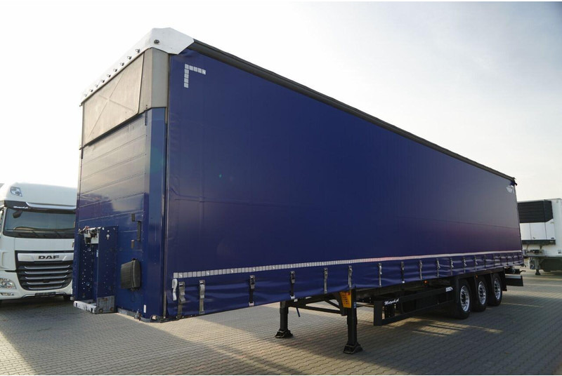 Schmitz Cargobull VARIOS / PODNOSZONY DACH HYDRAULICZNIE / OPONY 385/55 R22,5 / 20 - Тентованный полуприцеп: фото 2 Schmitz Cargobull VARIOS / PODNOSZONY DACH HYDRAULICZNIE / OPONY 385/55 R22,5 / 20 - Тентованный полуприцеп: фото 2