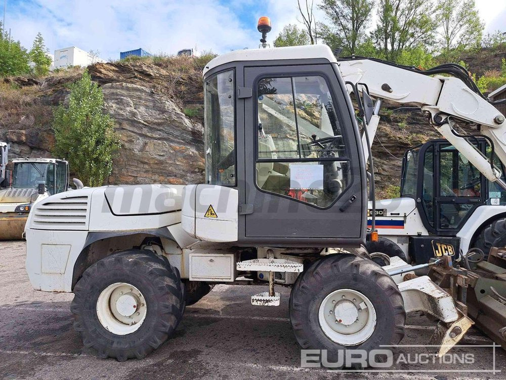 2014 Mecalac 12 MTX - Колёсный экскаватор: фото 1 2014 Mecalac 12 MTX - Колёсный экскаватор: фото 1