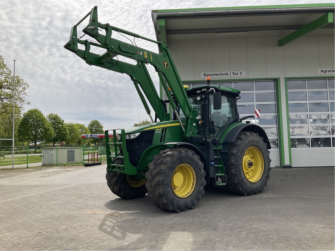 John Deere 7310 R - Трактор: фото 1 John Deere 7310 R - Трактор: фото 1