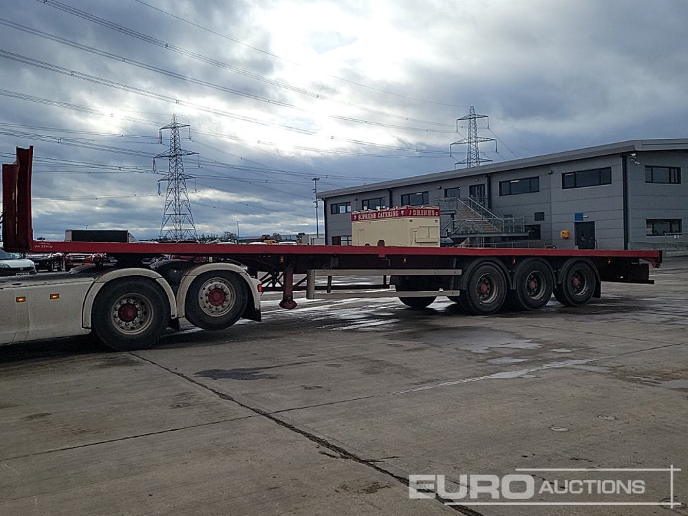 2002 Montracon Tri Axle Flat Bed Trailer - Полуприцеп бортовой/ Платформа: фото 1 2002 Montracon Tri Axle Flat Bed Trailer - Полуприцеп бортовой/ Платформа: фото 1