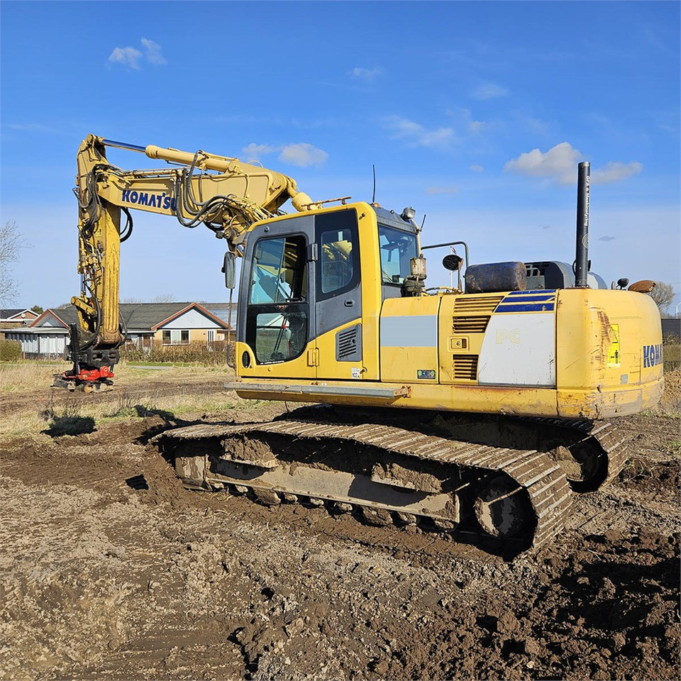 Komatsu PC210 - Гусеничный экскаватор: фото 1 Komatsu PC210 - Гусеничный экскаватор: фото 1