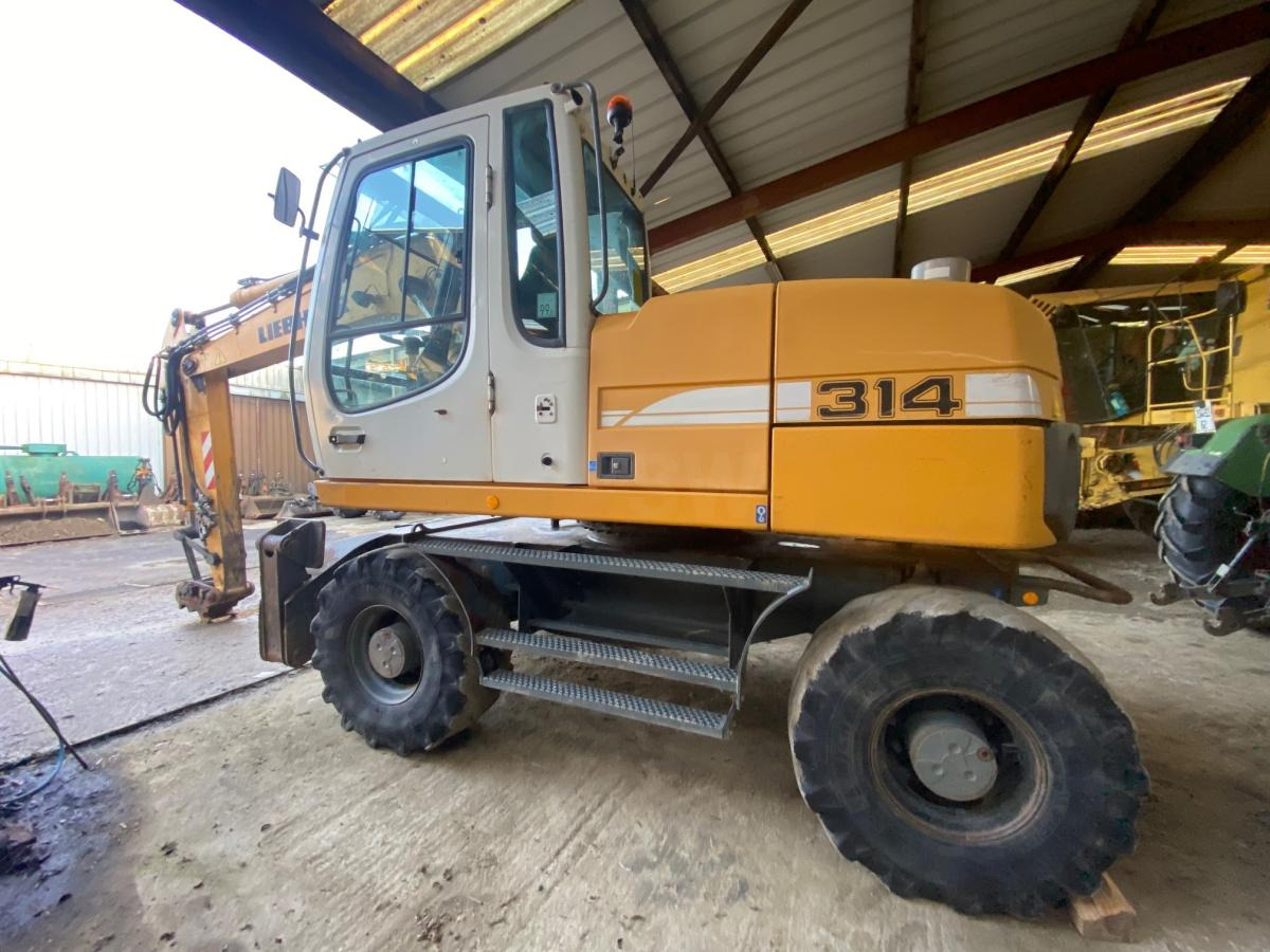 Liebherr A314 Litronic - Колёсный экскаватор: фото 4 Liebherr A314 Litronic - Колёсный экскаватор: фото 4