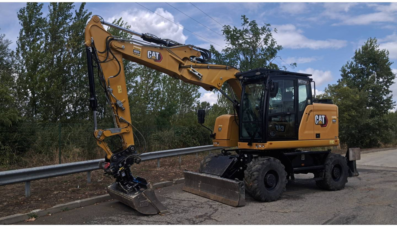 CAT M315F IVC - Колёсный экскаватор: фото 1 CAT M315F IVC - Колёсный экскаватор: фото 1