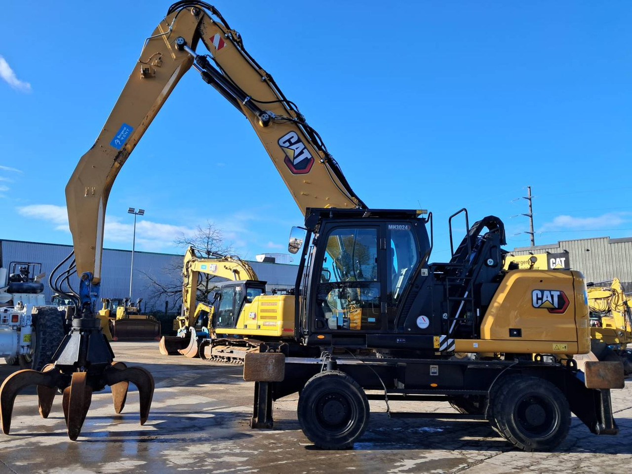 Колёсный экскаватор CAT MH3024: фото 10