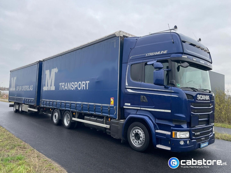 Scania R450 LB6X2MLB Euro 6 - Bouwjaar 2016 - Topline - Doorlaad-volume combi+ Wecon Middenas aanhangwagen - Good condition - Тентованный грузовик: фото 1 Scania R450 LB6X2MLB Euro 6 - Bouwjaar 2016 - Topline - Doorlaad-volume combi+ Wecon Middenas aanhangwagen - Good condition - Тентованный грузовик: фото 1