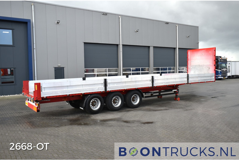 Kögel SN 24 FLATBED | ALU BOARDS * HARDWOOD FLOOR * NL TRAILER * APK 09-2025 * TOP! - Полуприцеп бортовой/ Платформа: фото 1 Kögel SN 24 FLATBED | ALU BOARDS * HARDWOOD FLOOR * NL TRAILER * APK 09-2025 * TOP! - Полуприцеп бортовой/ Платформа: фото 1