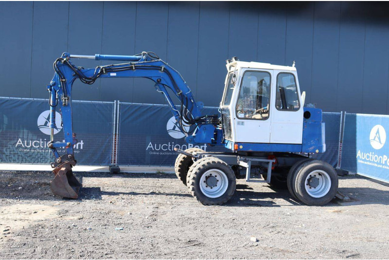 Atlas 1004 - Колёсный экскаватор: фото 1 Atlas 1004 - Колёсный экскаватор: фото 1