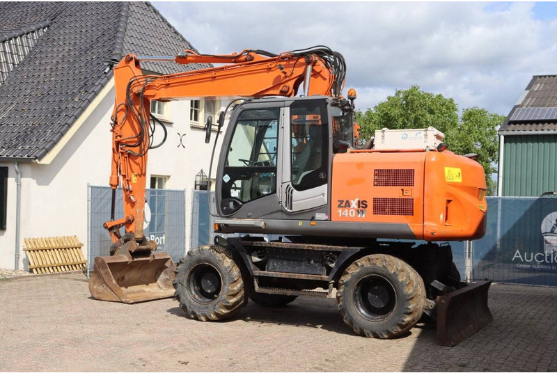 Hitachi ZX140W-3 - Колёсный экскаватор: фото 3 Hitachi ZX140W-3 - Колёсный экскаватор: фото 3