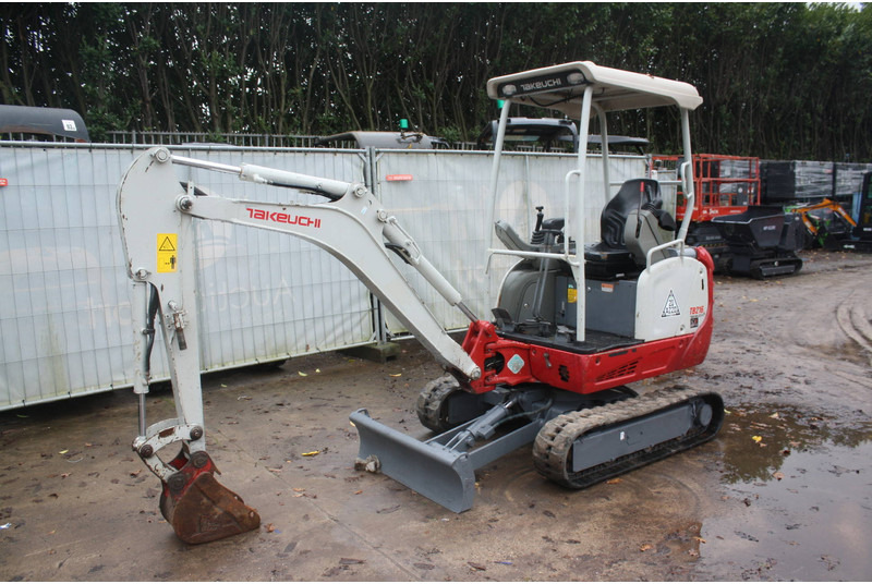 Takeuchi TB216 - Мини-экскаватор: фото 1 Takeuchi TB216 - Мини-экскаватор: фото 1
