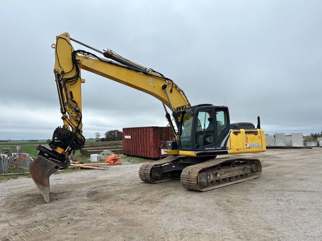New Holland Kobelco E215C - Гусеничный экскаватор: фото 1 New Holland Kobelco E215C - Гусеничный экскаватор: фото 1